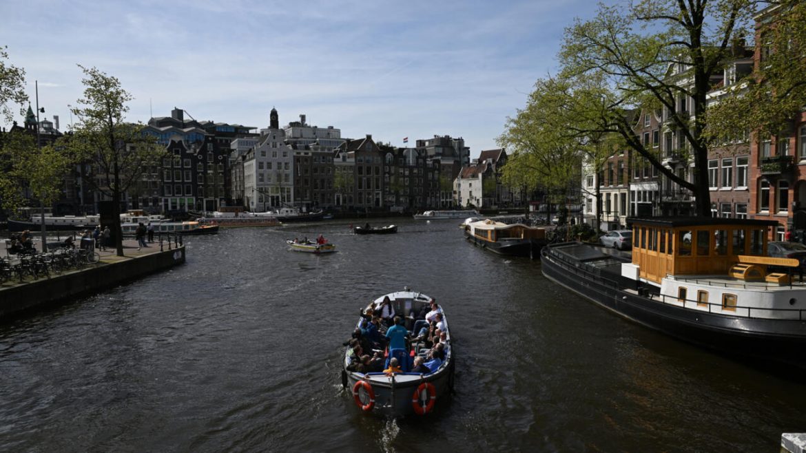 Anger as Amsterdam allows 'ugly' solar panels on historic canal houses