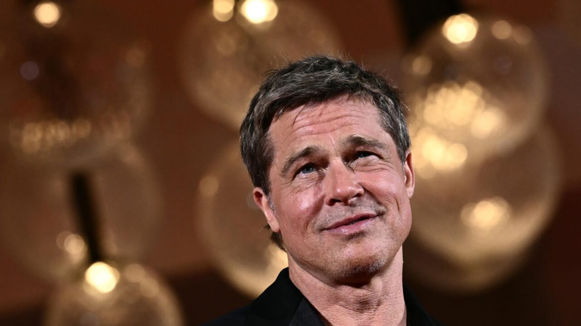 Brad Pitt isn't messaging you, rep warns, after adoring fan scammed